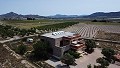 Fabelhafte, zu 70 % fertiggestellte Neubauvilla mit 7 Schlafzimmern und 4 Badezimmern zum Verkauf in Salinas. in Real Estate Alicante