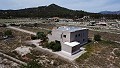 Fabelhafte, zu 70 % fertiggestellte Neubauvilla mit 7 Schlafzimmern und 4 Badezimmern zum Verkauf in Salinas. in Real Estate Alicante