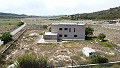 Fabelhafte, zu 70 % fertiggestellte Neubauvilla mit 7 Schlafzimmern und 4 Badezimmern zum Verkauf in Salinas. in Real Estate Alicante