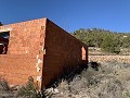 Grand terrain avec une construction incomplète in Real Estate Alicante