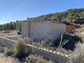 Grand terrain avec une construction incomplète in Real Estate Alicante