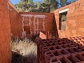 Grand terrain avec une construction incomplète in Real Estate Alicante