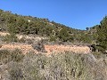 Grand terrain avec une construction incomplète in Real Estate Alicante