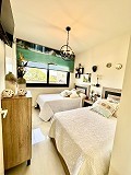 Superbe bungalow au rez-de-chaussée avec piscine commune in Real Estate Alicante