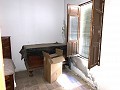Herenhuis met 4 slaapkamers en tuin in Real Estate Alicante