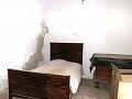 Herenhuis met 4 slaapkamers en tuin in Real Estate Alicante
